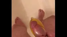 Play Filling a condom with piss and then cum